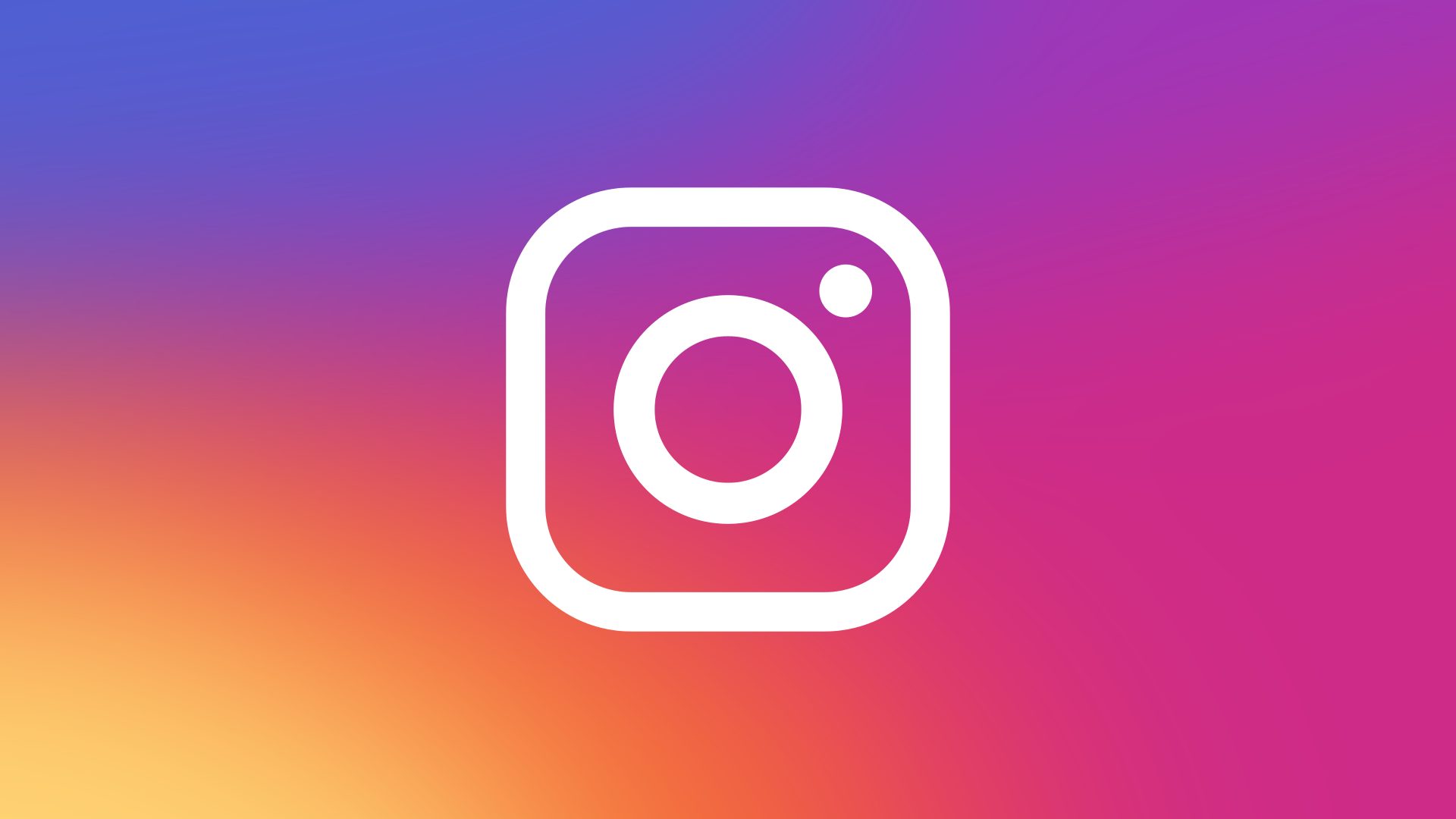 A white Instagram logo (which looks like the outine of a camera) on a colourful gradient background