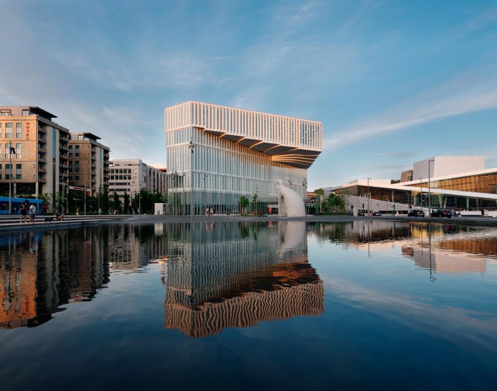 A large pool of water outside of Oslo's new central library